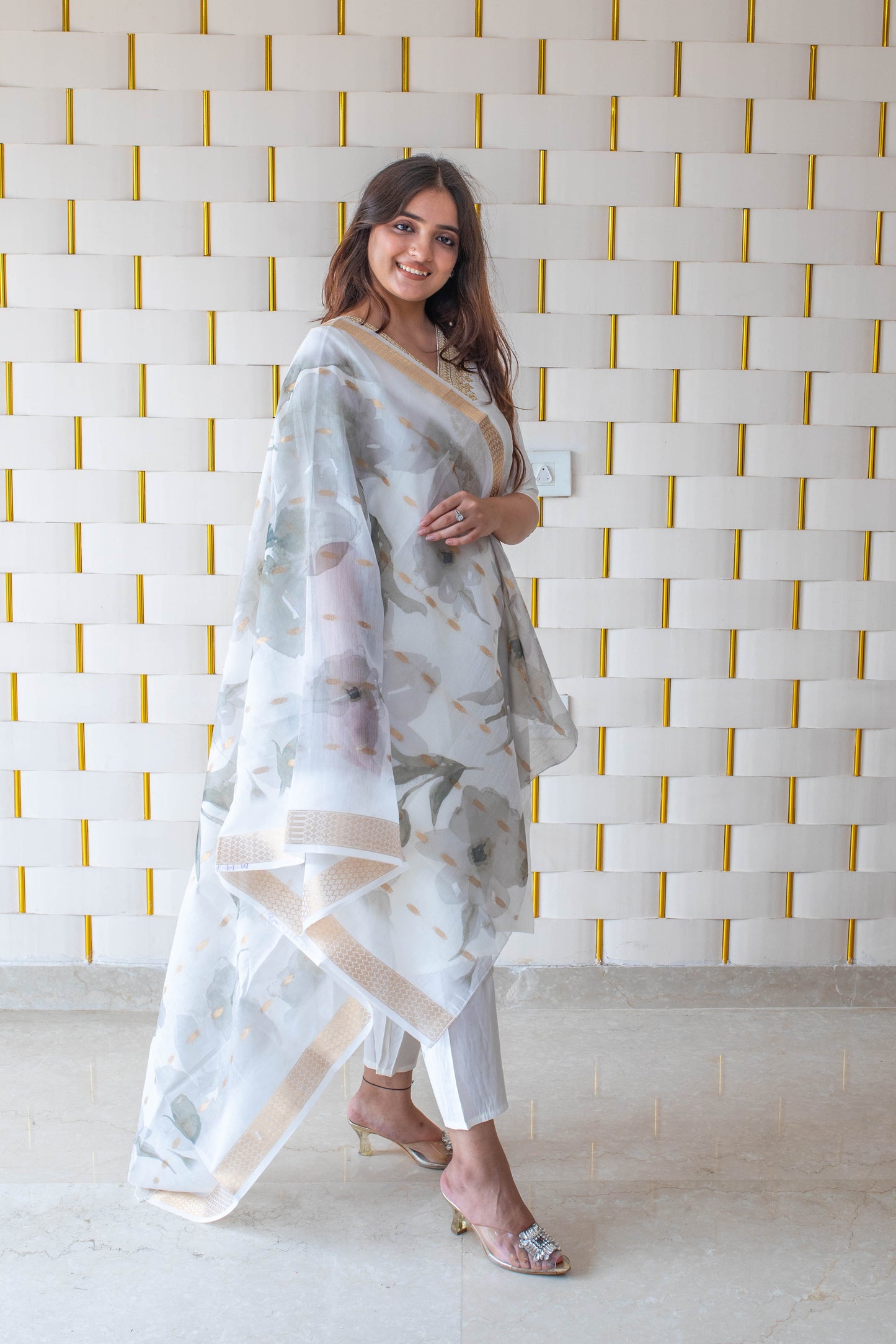 White Suit with Golden Neck work and Golden Zari work on Dupatta