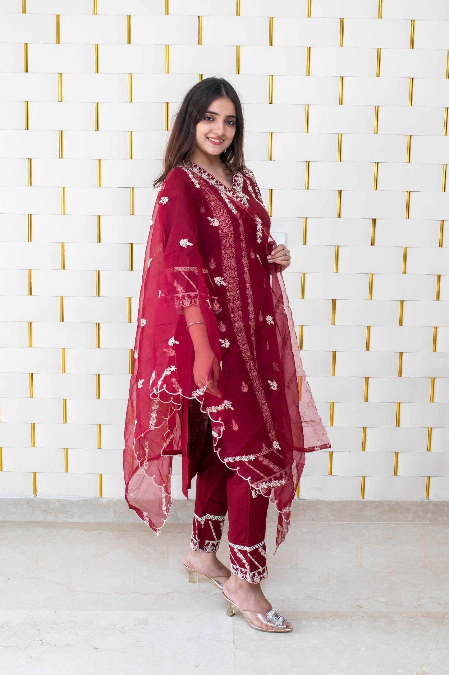 Maroon suit with all over white kadhai work with with net dupatta