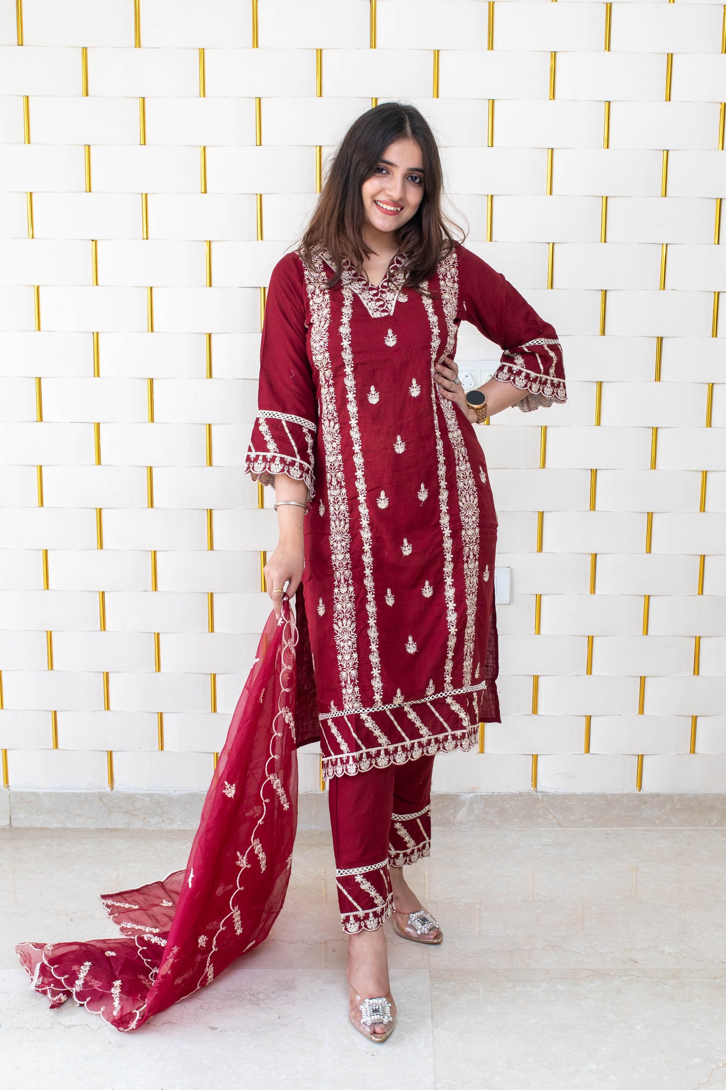Maroon suit with all over white kadhai work with with net dupatta