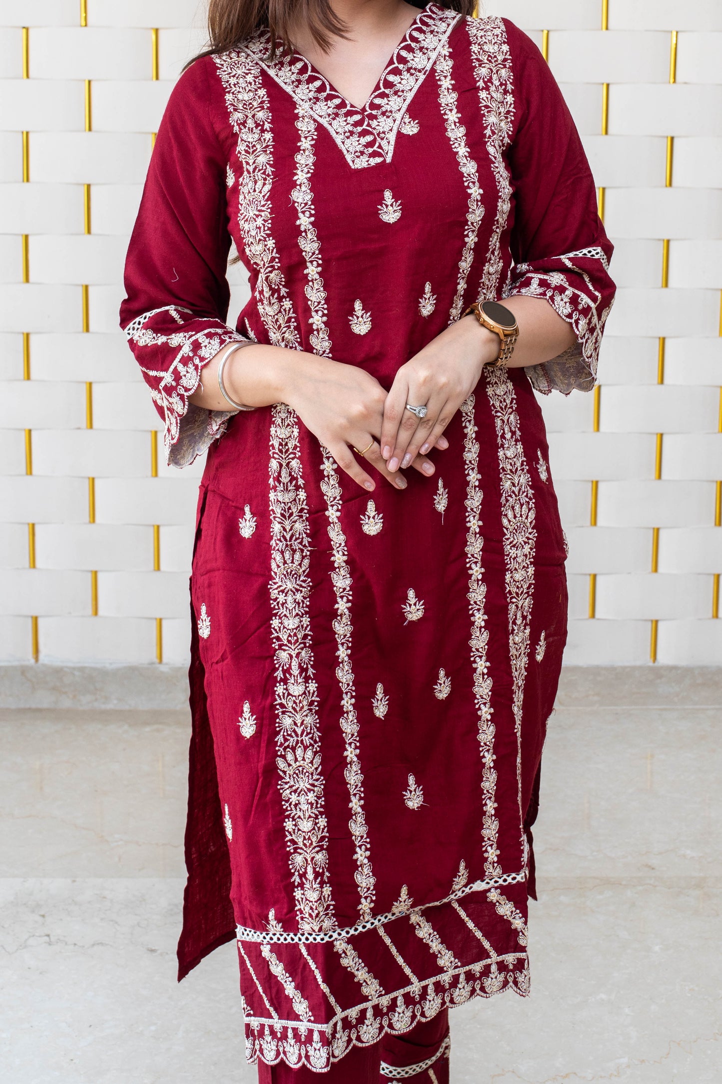 Maroon suit with all over white kadhai work with with net dupatta