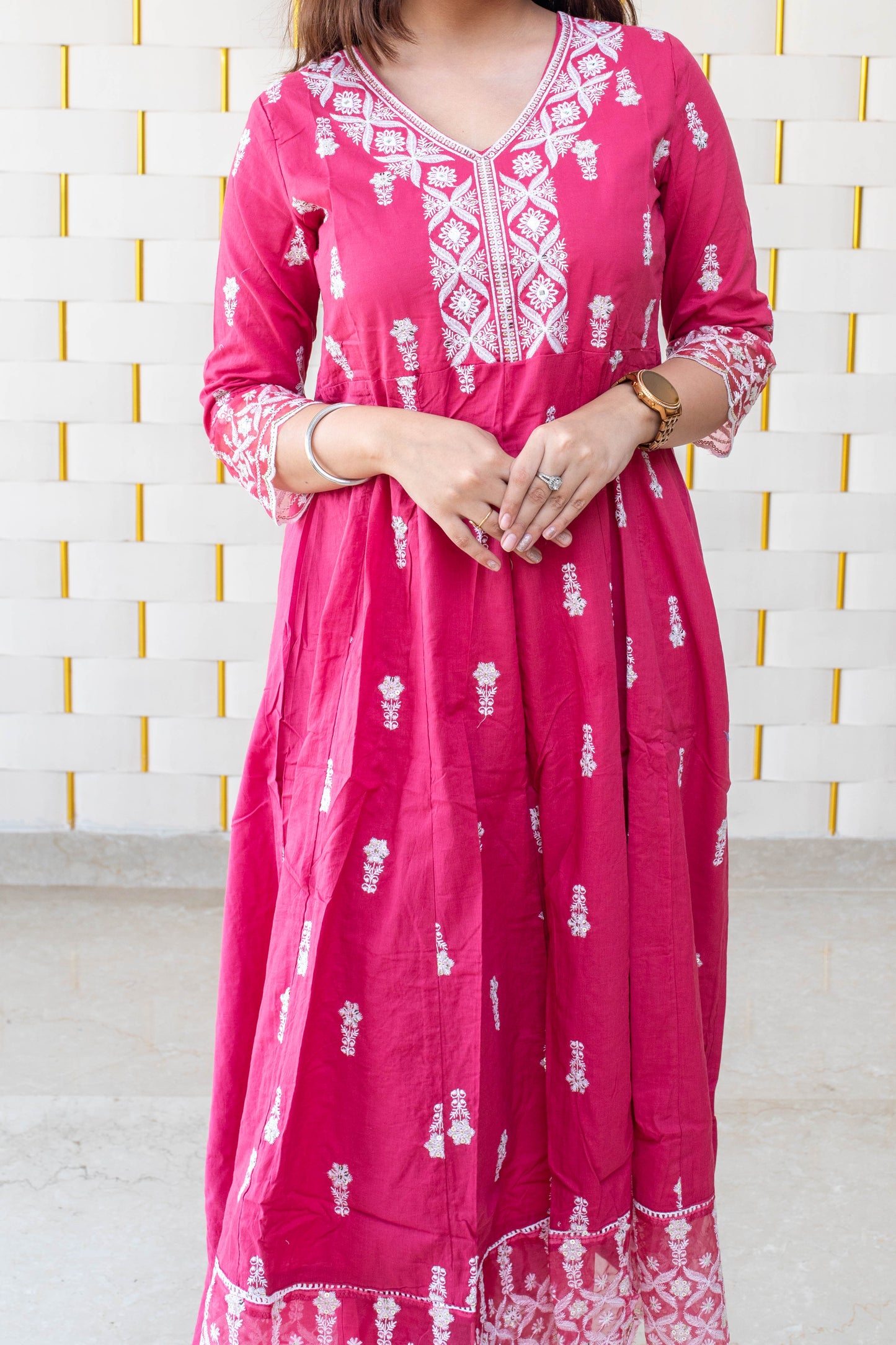 Pink Anarkali suit with white kadhai, net lace on borders and net dupatta