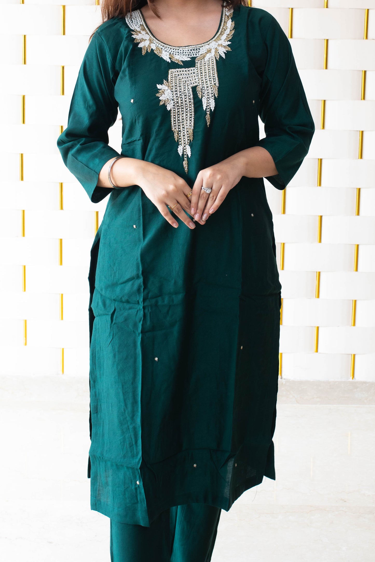 Bottle green Suit with kadhai work and floral Dupatta