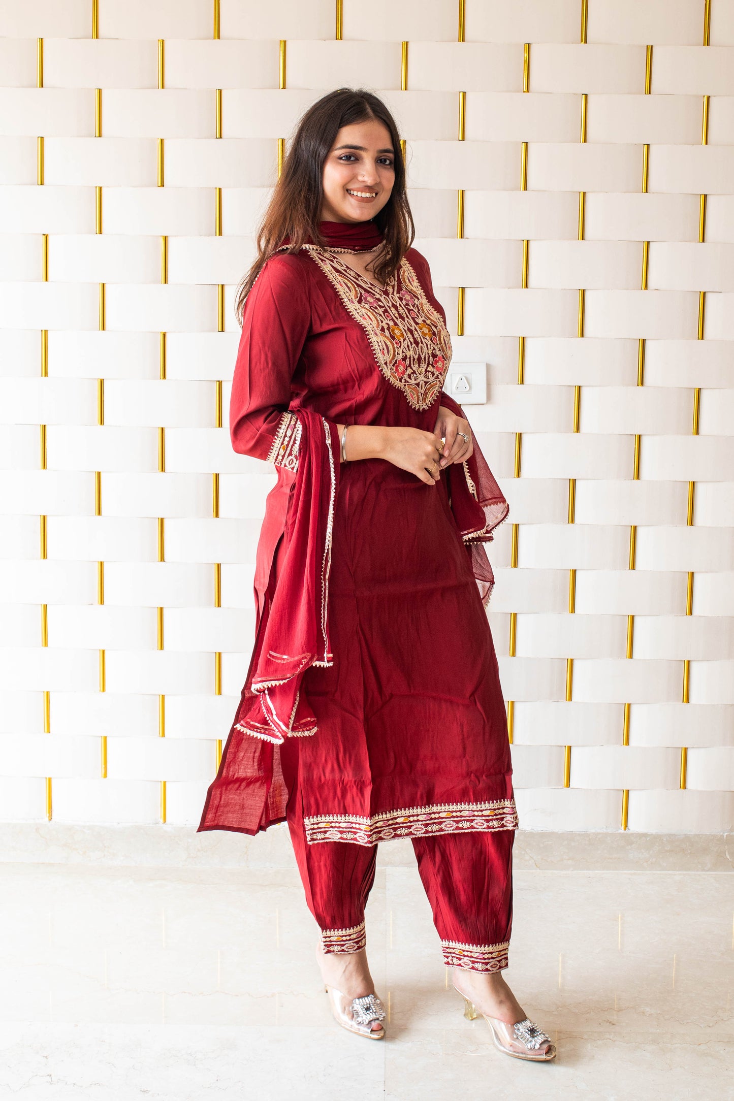 Maroon Suit with kadhai work on neck, sleeves and borders