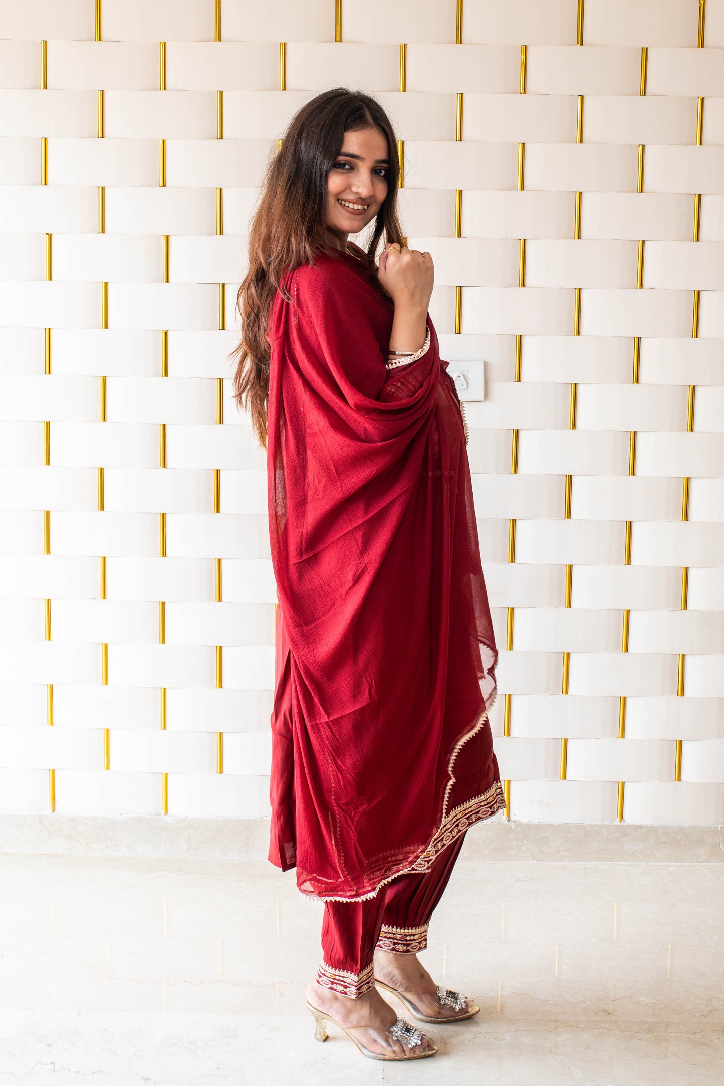 Maroon Suit with kadhai work on neck, sleeves and borders