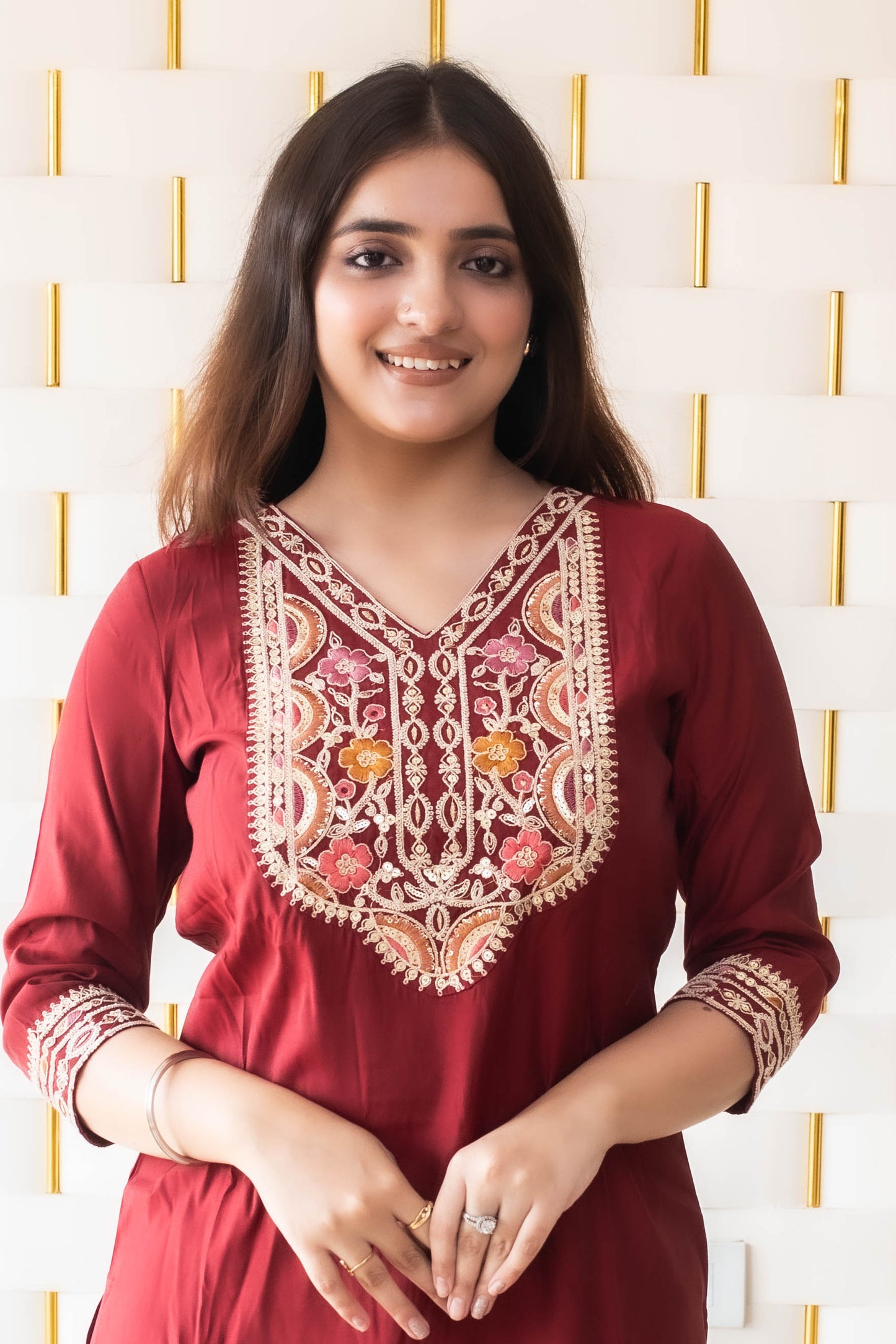 Maroon Suit with kadhai work on neck, sleeves and borders
