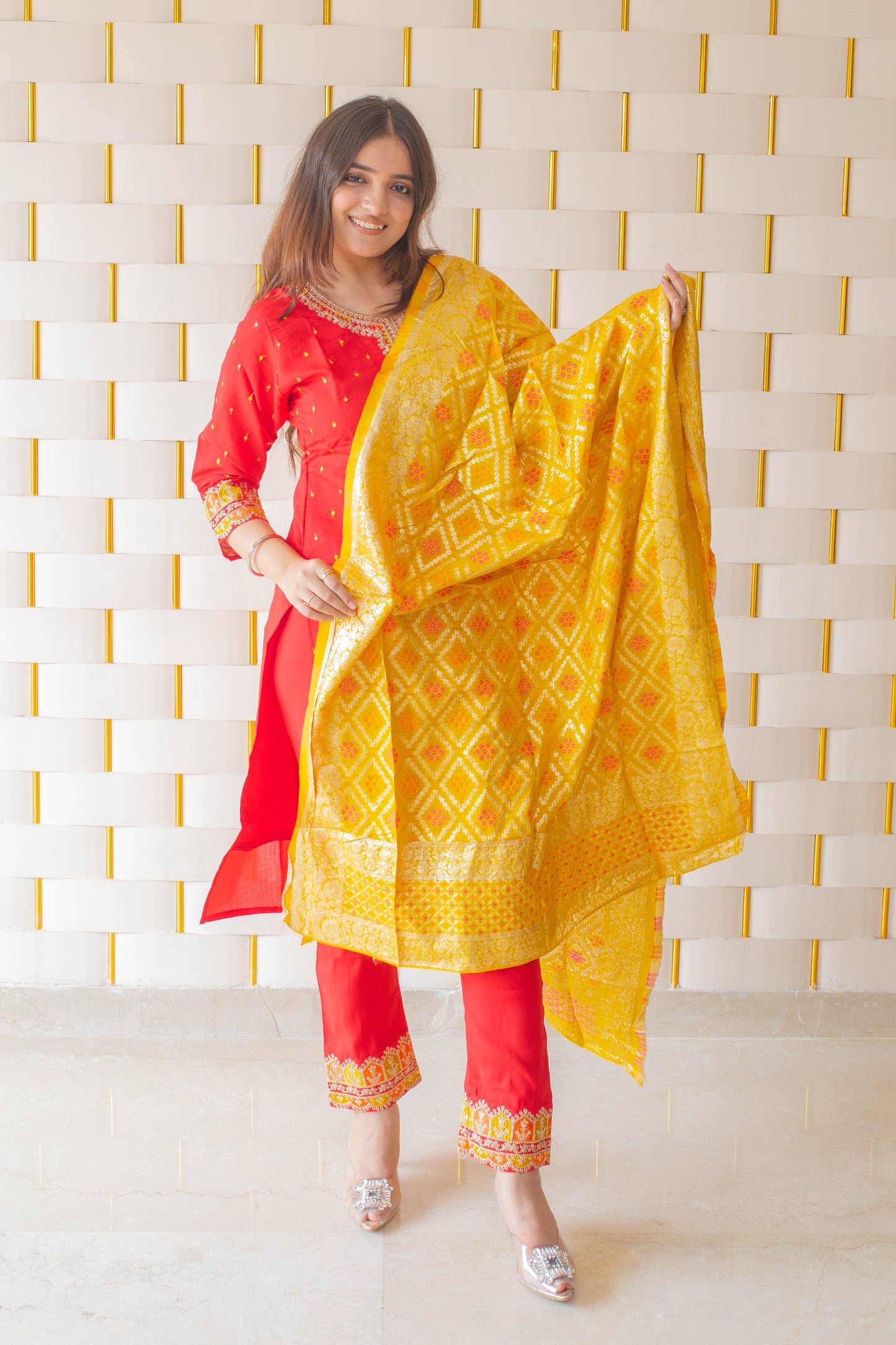 Red Suit with kadhai work on neck, sleeves and borders with Yellow Silk Dupatta