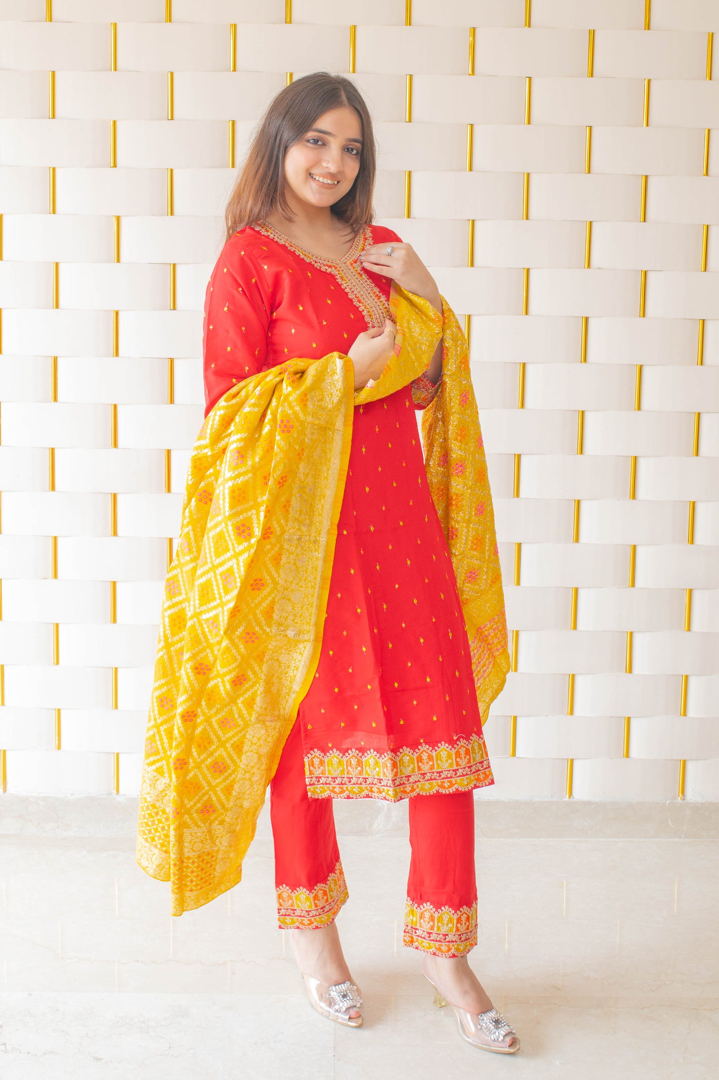 Red Suit with kadhai work on neck, sleeves and borders with Yellow Silk Dupatta