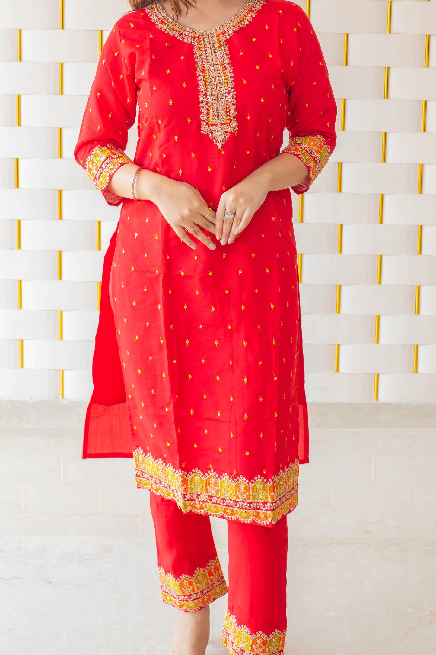 Red Suit with kadhai work on neck, sleeves and borders with Yellow Silk Dupatta