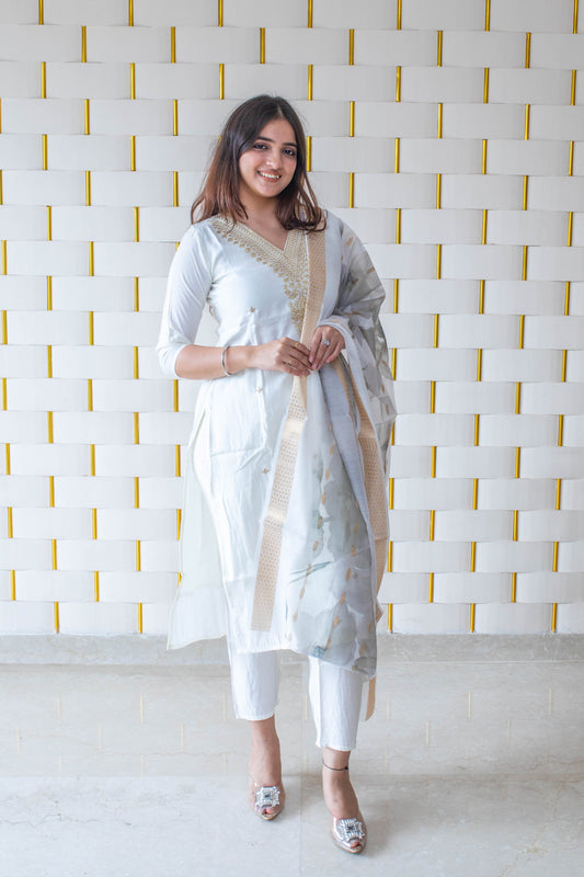 White Suit with Golden Neck work and Golden Zari work on Dupatta