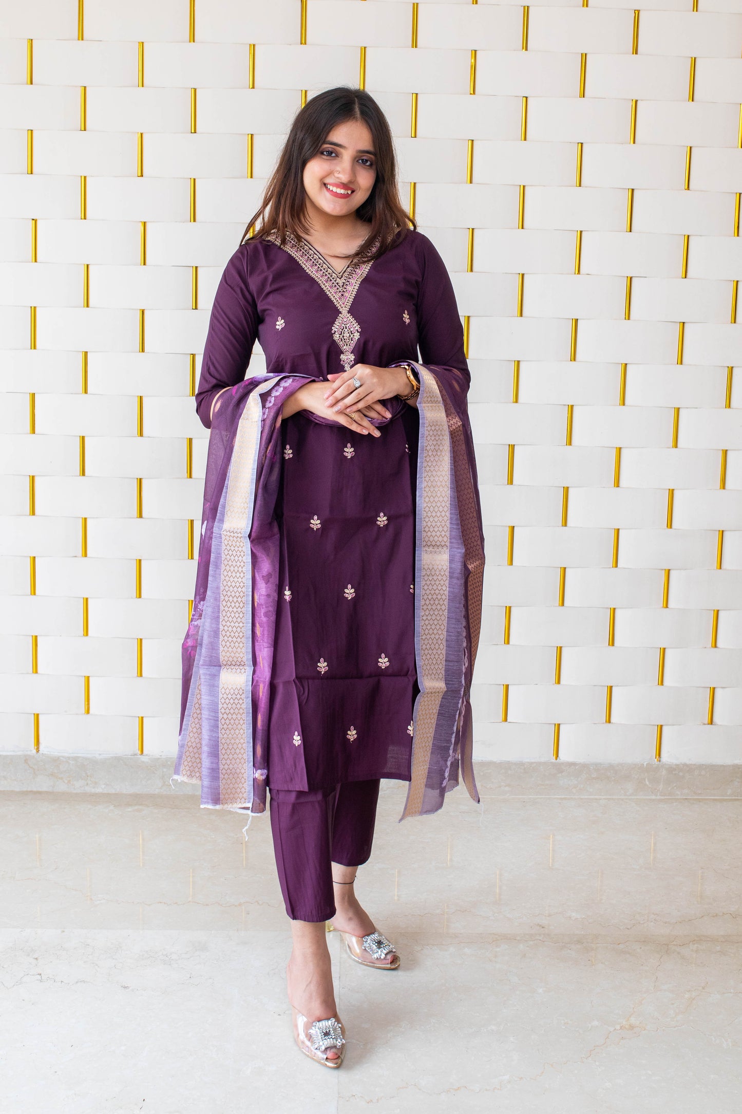 Deep Purple Suit with handcrafted Golden Beads work on neck with Golden Zari work on Dupatta