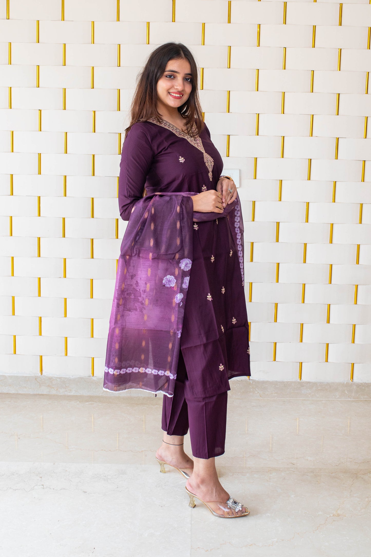 Deep Purple Suit with handcrafted Golden Beads work on neck with Golden Zari work on Dupatta