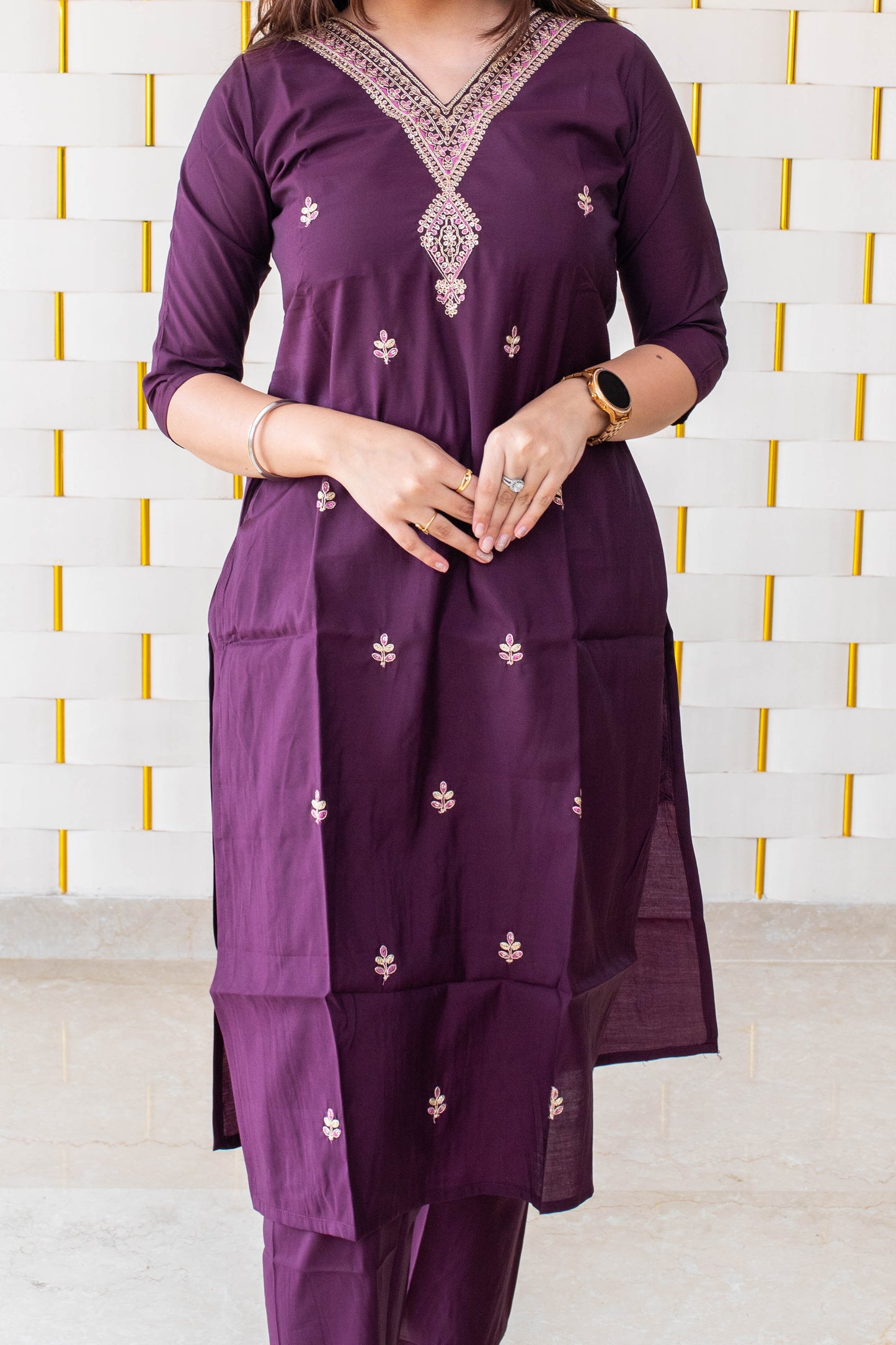 Deep Purple Suit with handcrafted Golden Beads work on neck with Golden Zari work on Dupatta