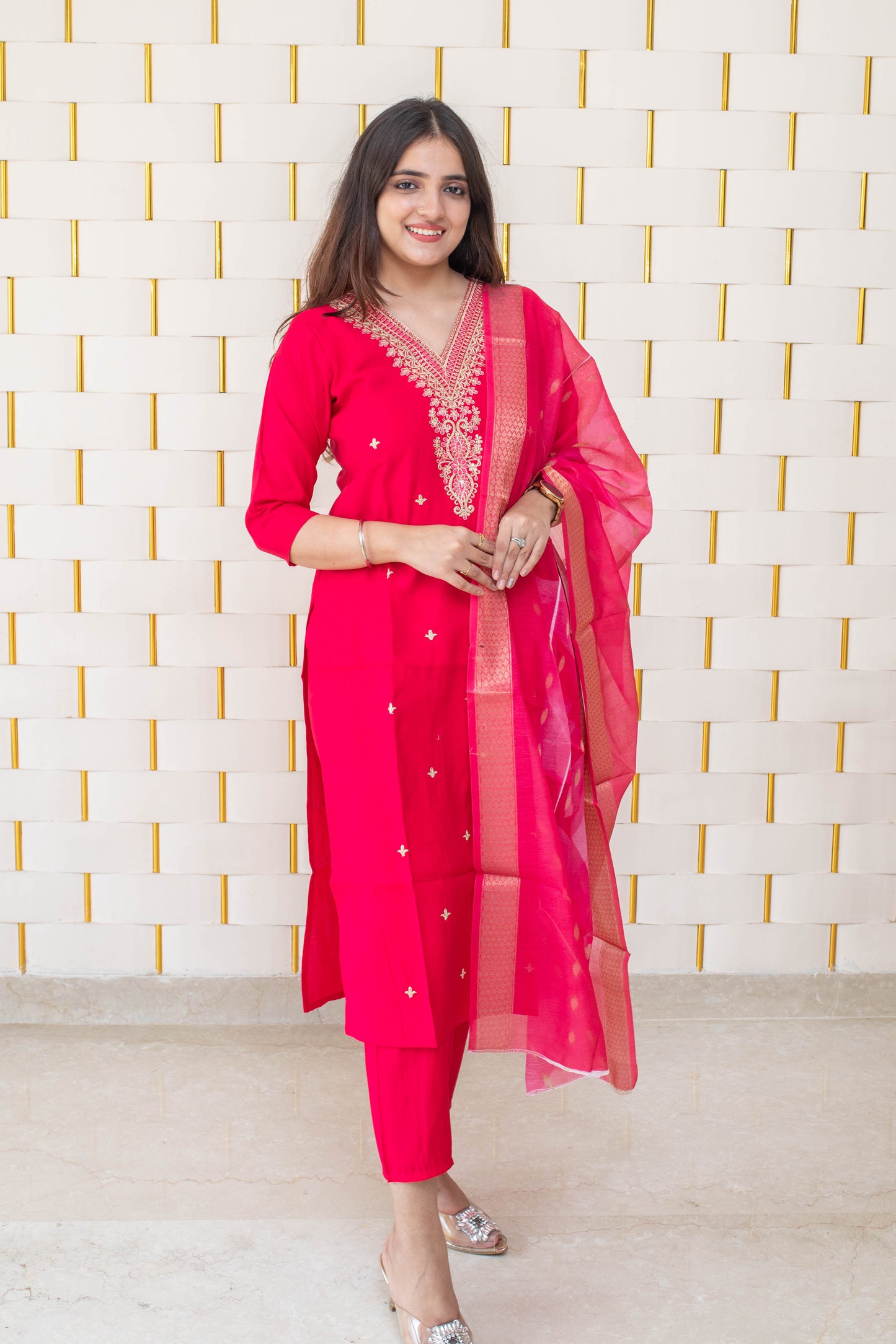 Bright Pink Suit with golden work on neck and golden zari work on Dupatta