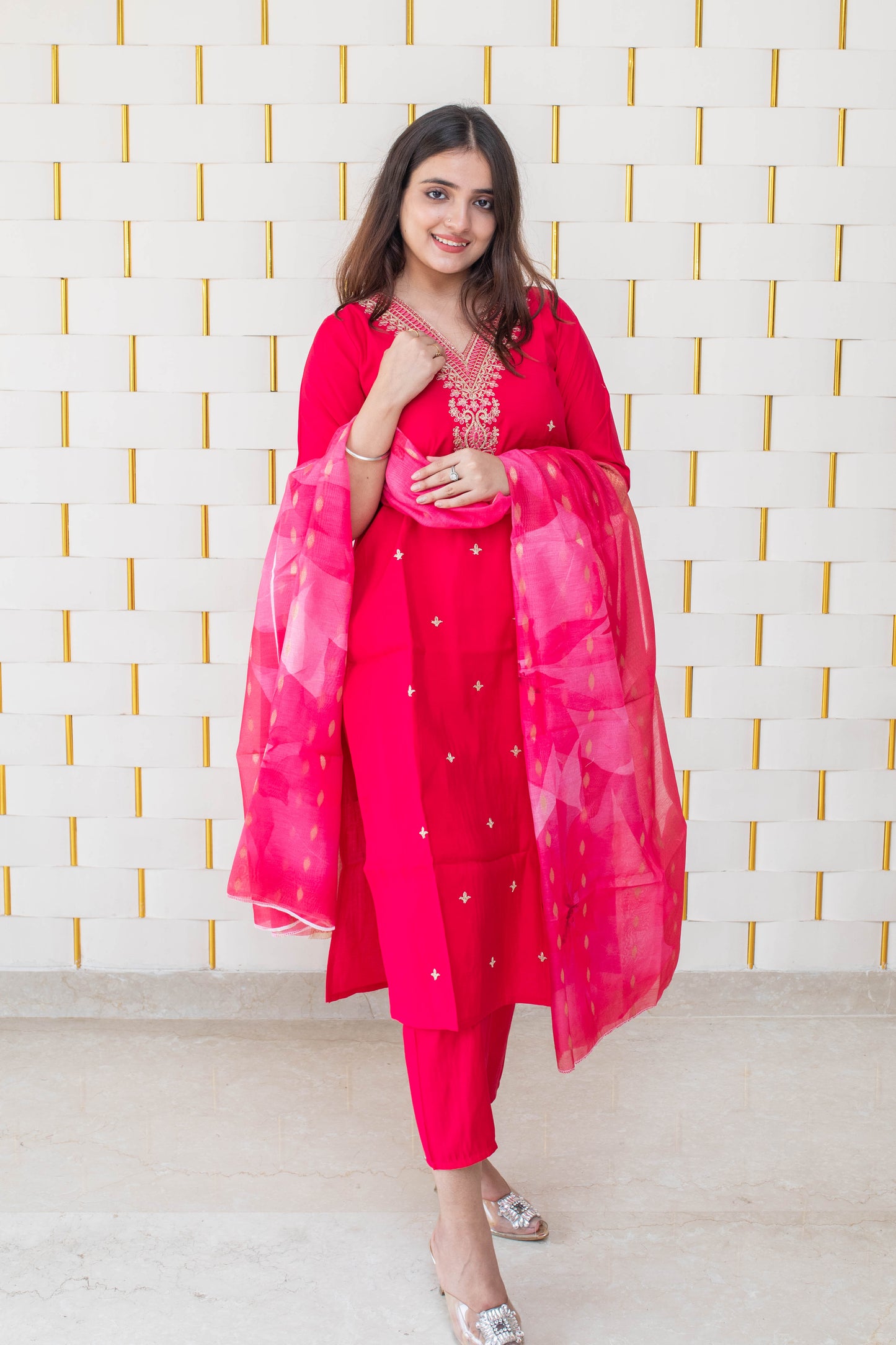 Bright Pink Suit with golden work on neck and golden zari work on Dupatta