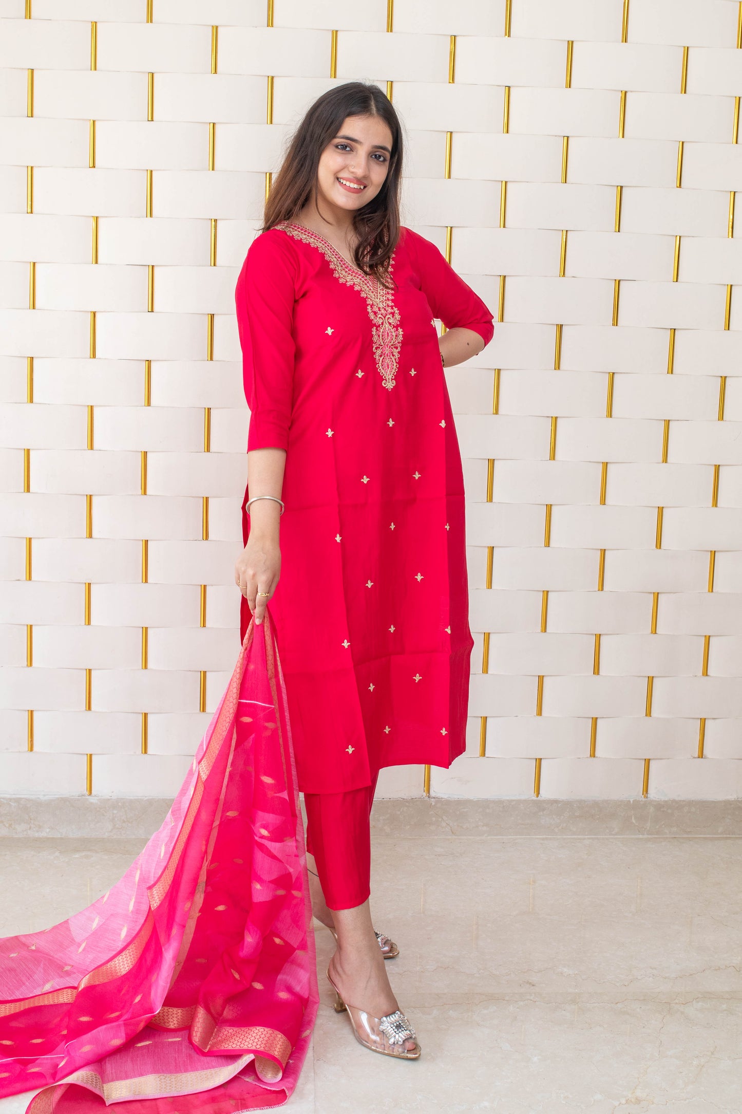 Bright Pink Suit with golden work on neck and golden zari work on Dupatta