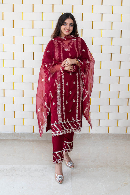 Maroon suit with all over white kadhai work with with net dupatta